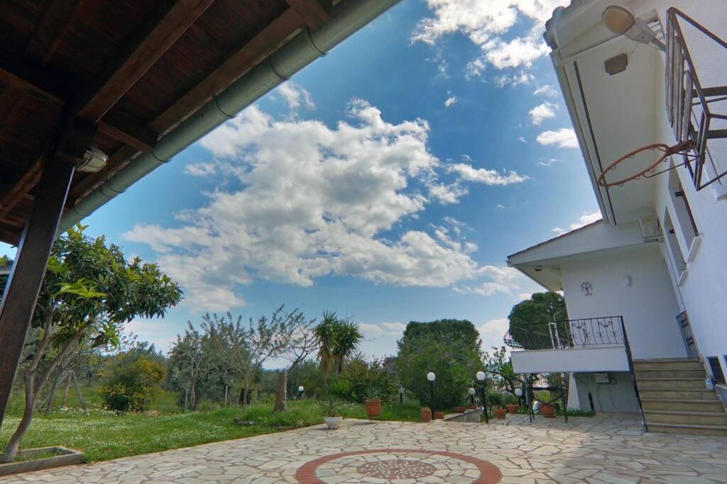 Triple H Villa Волос Екстериор снимка